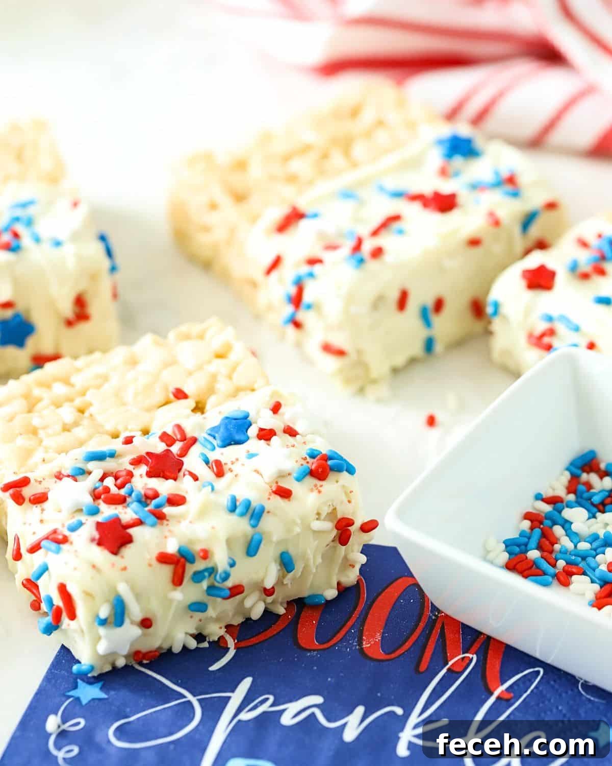 Fourth of July Rice Krispie Treats: Patriotic Red, White & Blue Recipe 8 A Marshmallow treat with red, white, and blue sprinkles on it.