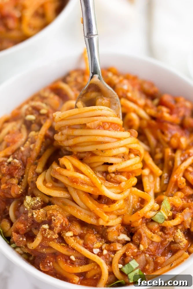 instant pot spaghetti, cooked twirled around a fork