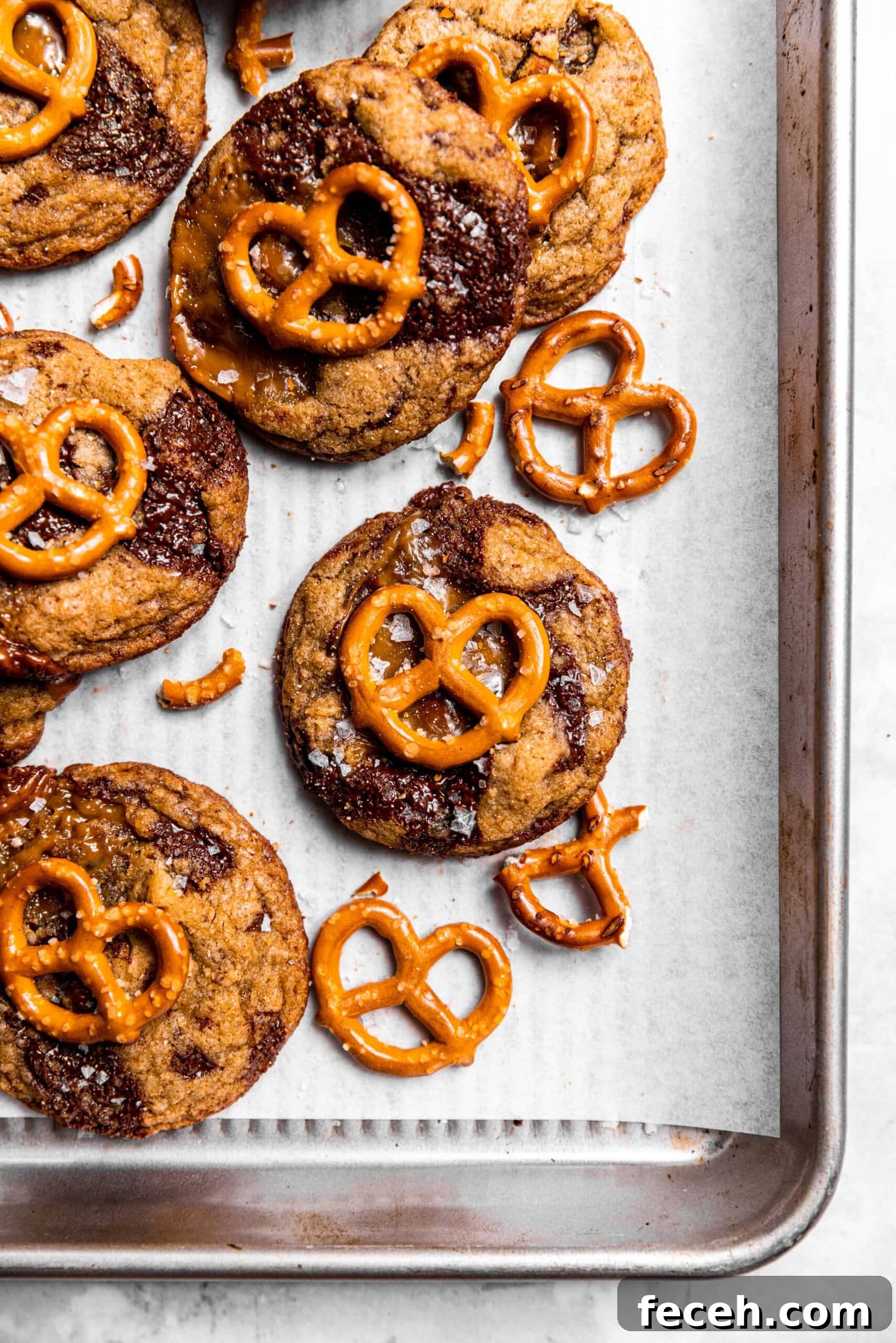 Salted Caramel Pretzel Chocolate Chip Cookies on a baking sheet