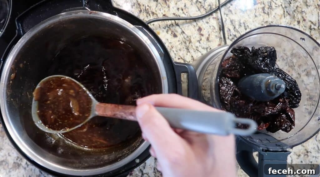 Instant Pot Birria Quesabirria Tacos Recipe 18 Using a ladle, add some broth (which we'll now call consommé) to the chiles in the food processor...