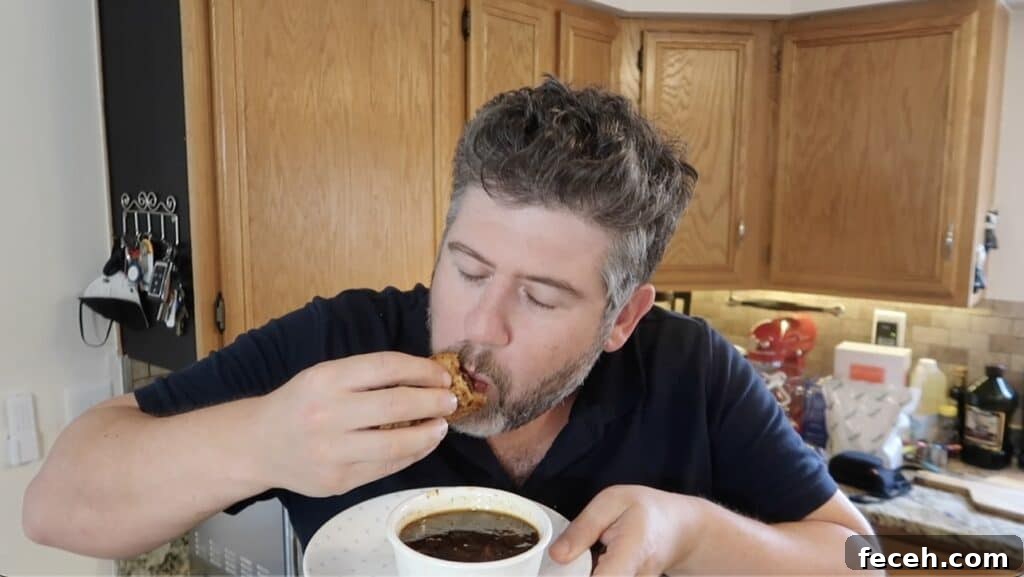 Instant Pot Birria Quesabirria Tacos Recipe 31 Man eating taco