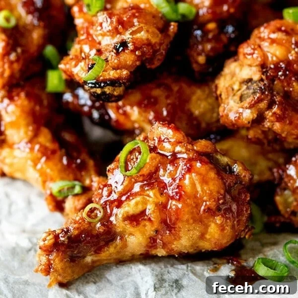 These Asian Chicken Wings are Sticky AND Crispy . The best party food ever!