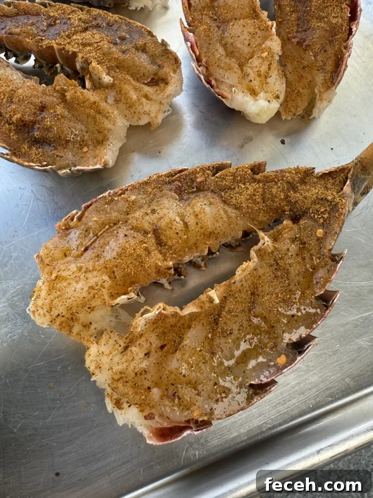 Chipotle Honey Grilled Lobster Tails Recipe 7 seasoned lobster tails on a silver tray