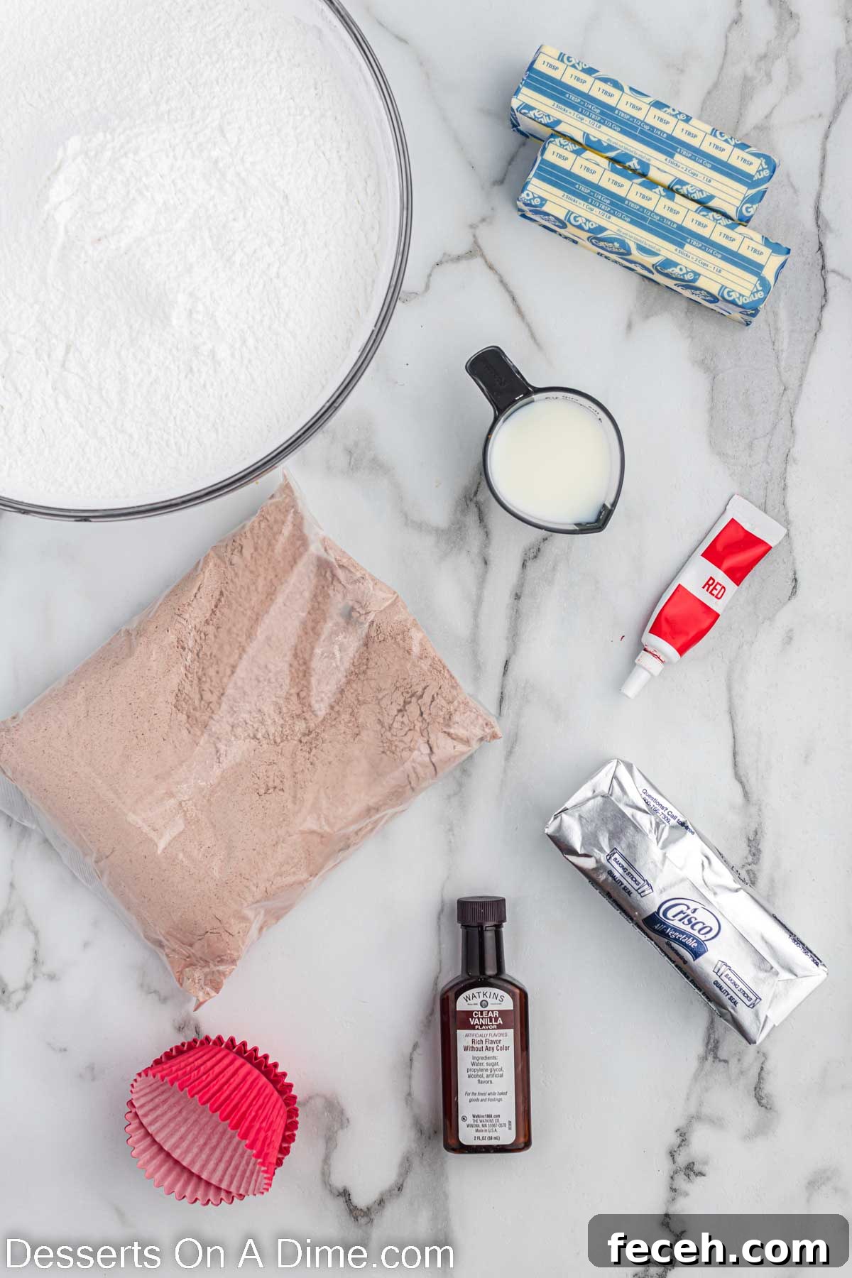 Ingredients needed - chocolate cake mix, cupcake liners, shortening, butter, vanilla, powdered sugar, milk, red food coloring