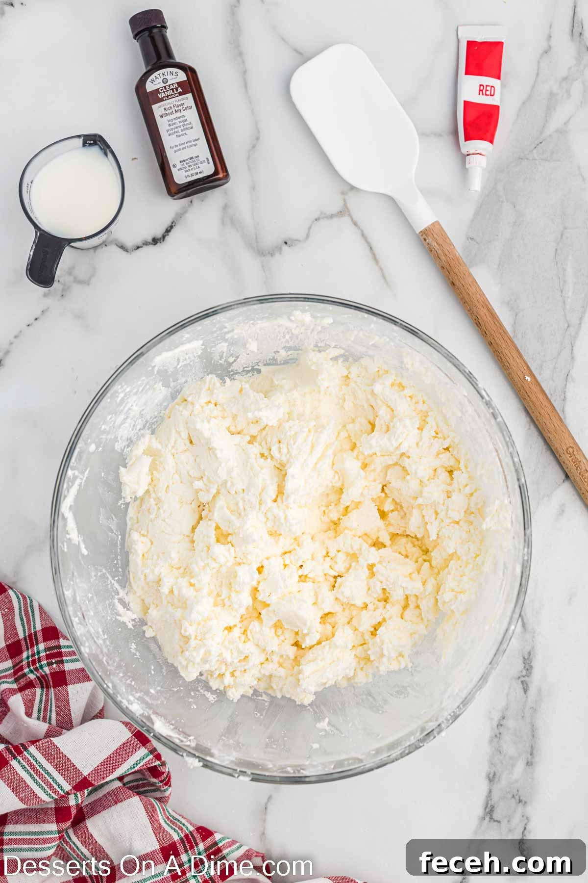 Bowl with powdered sugar added to the butter mixture and combined.