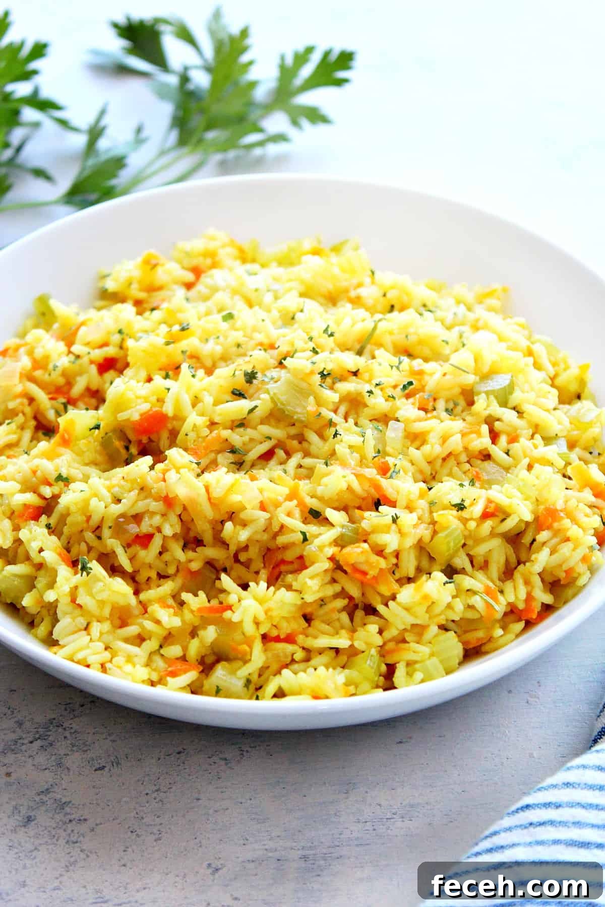 Rice pilaf in a white bowl.