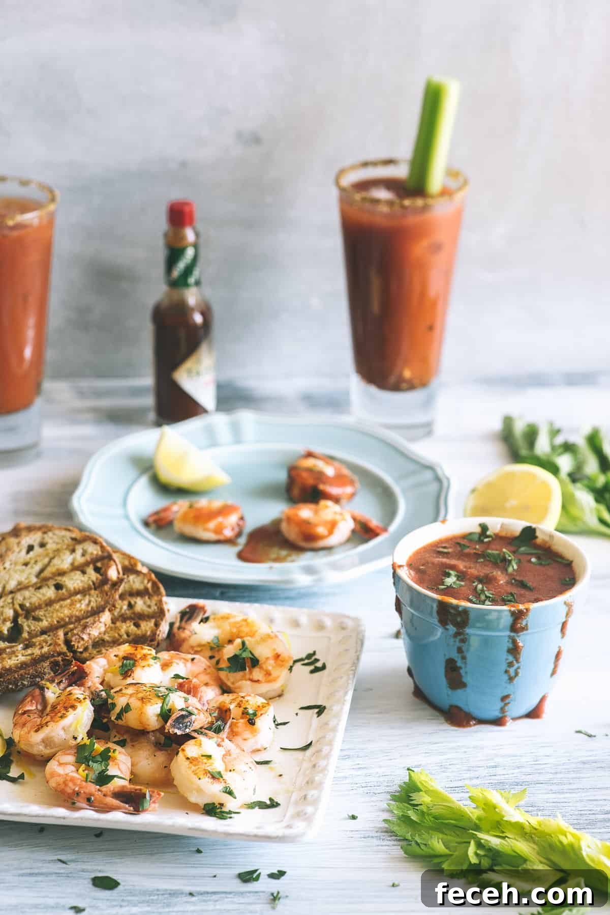 Grilled Shrimp with Spicy Bloody Mary Dipping Sauce 2 barbecued prawns with a Bloody Mary dipping sauce