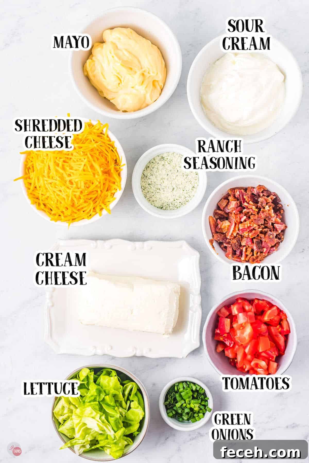 Ingredients for BLT Dip all in small white bowls.