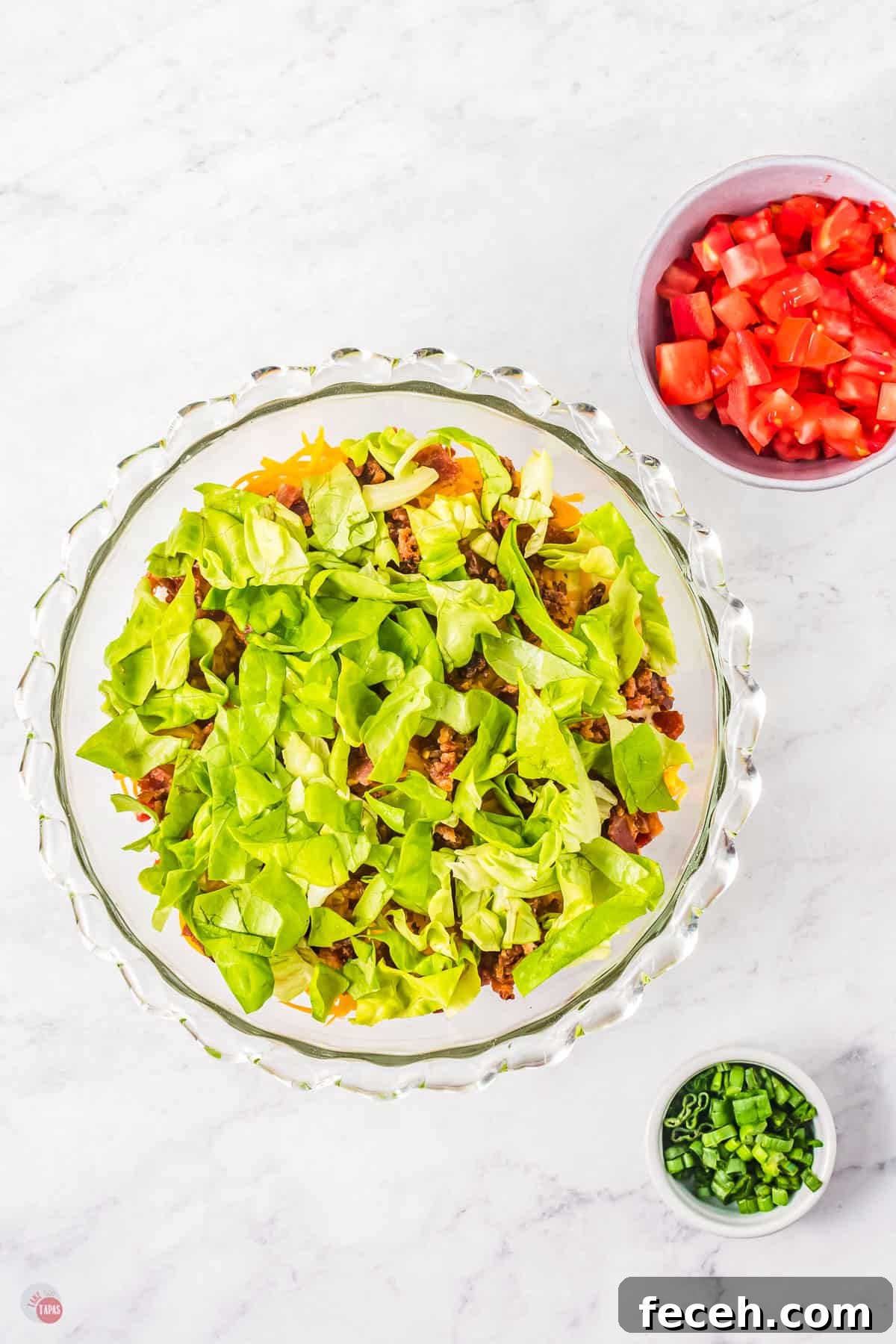 lettuce and tomatoes in a bowl