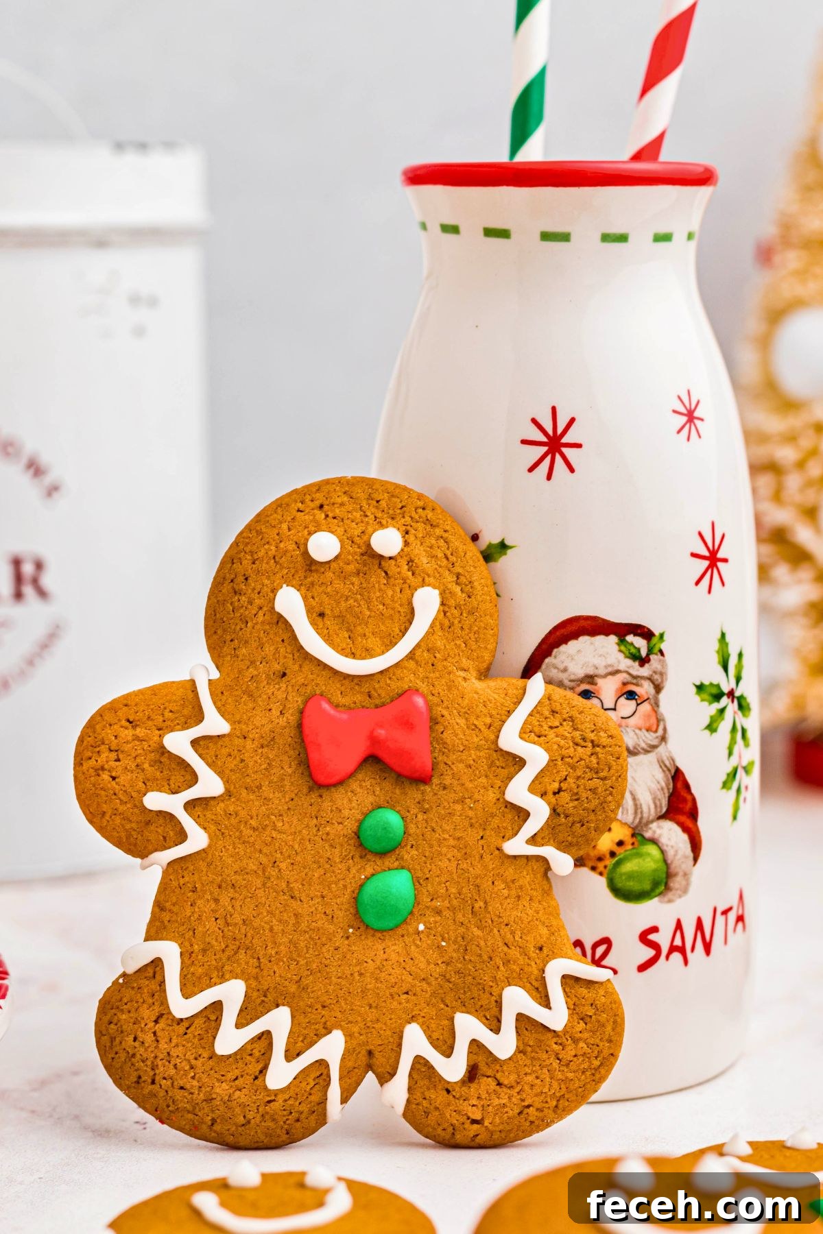 Classic Gingerbread Cookie Recipe for Soft, Spiced Cookies 12 Gingerbread man cookie leaning up against a bottle of milk.