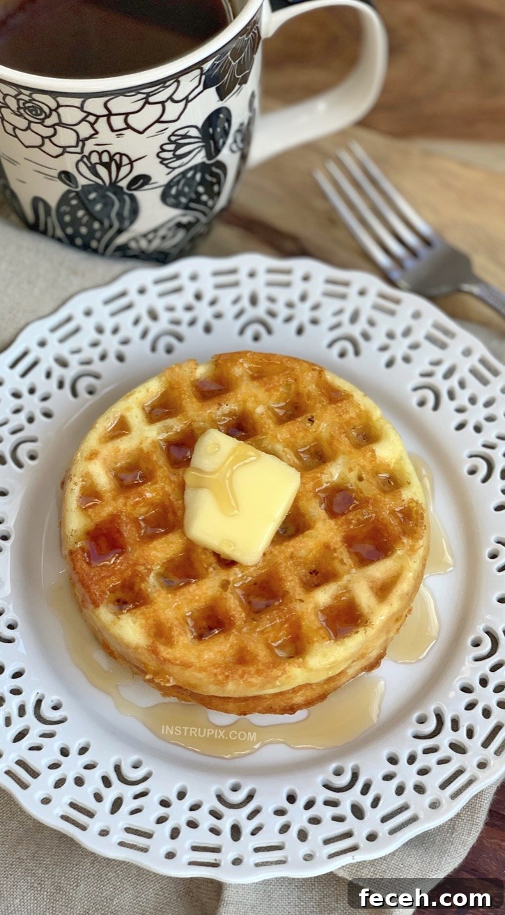 Simple Keto Waffle Recipe made with just 3 ingredients: almond flour, an egg and cheese! YUM!