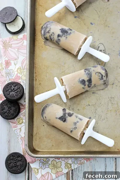 Several Coffee Ice Pops on a baking sheet.