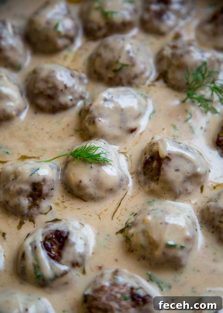close up of Swedish Meatballs with Gravy in skillet