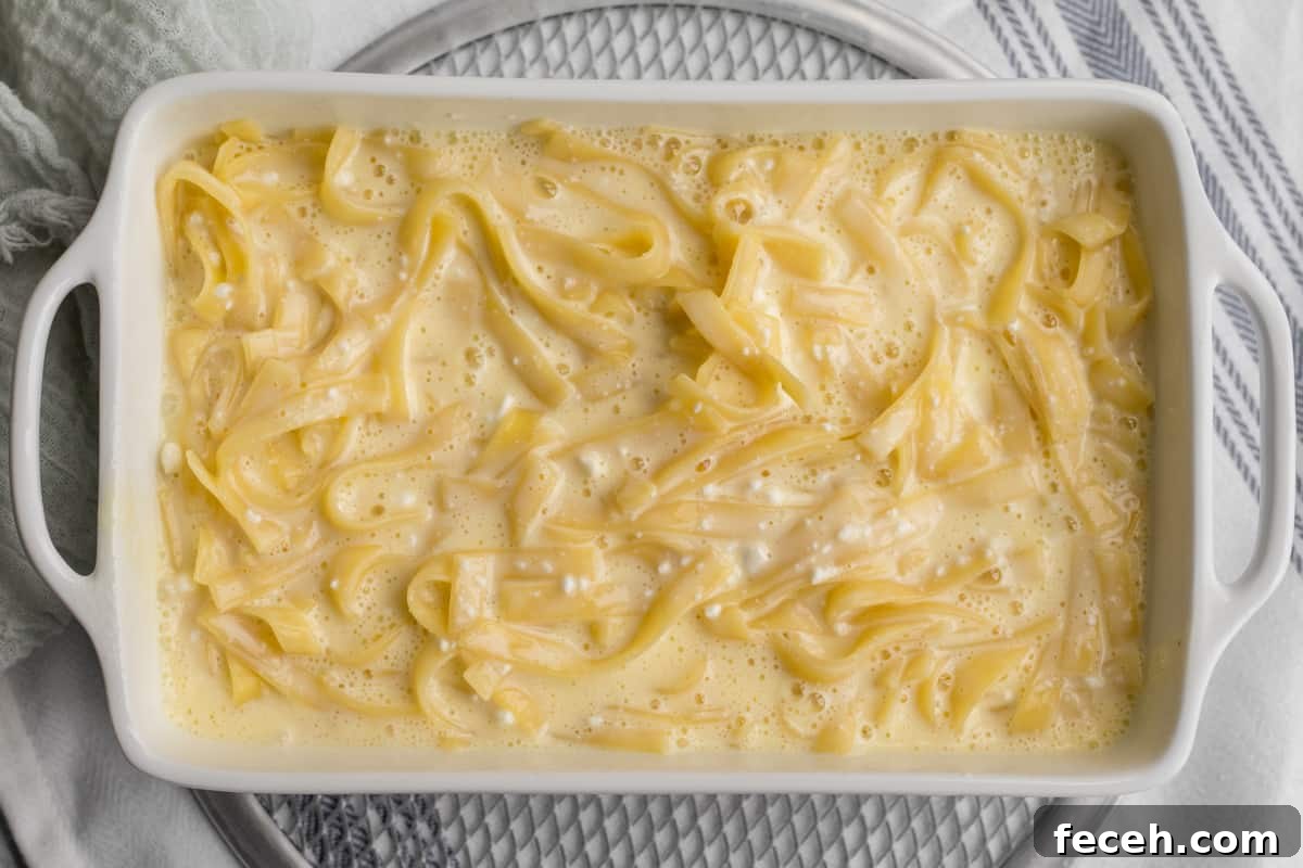 noodle kugel in baking pan with no topping