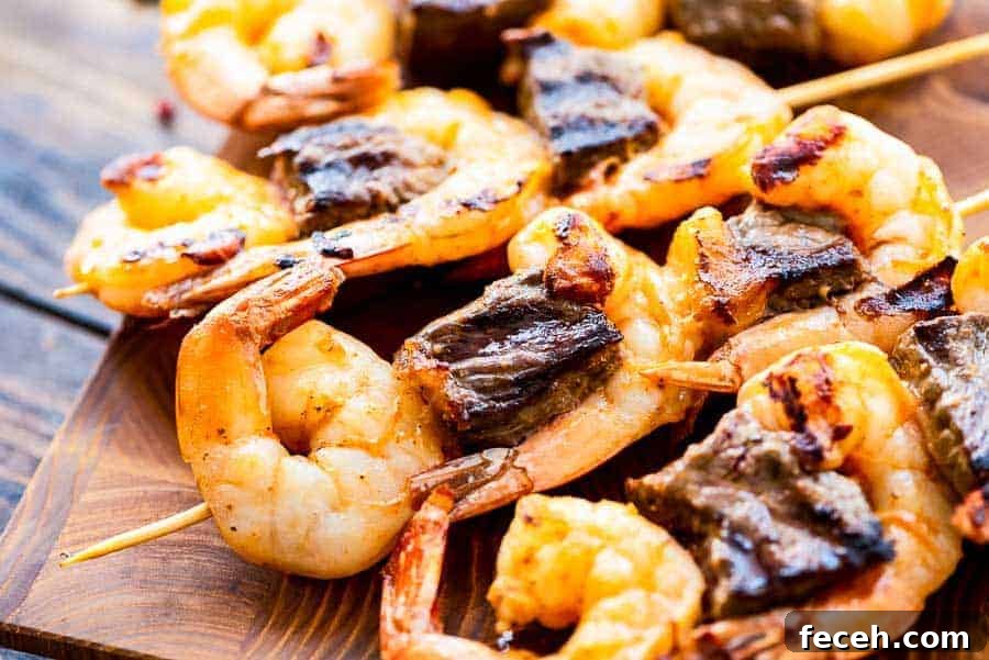 Steak and Shrimp Kabobs on cutting board