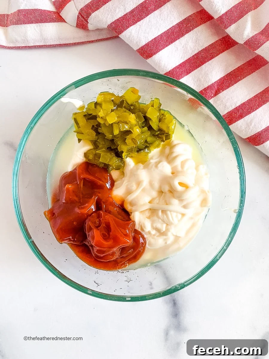 In-N-Out Spread Copycat Recipe: How to Make the Famous Sauce 6 Pickle relish, ketchup, and mayonnaise in a small glass bowl.