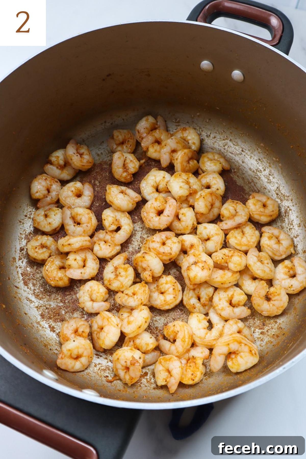 pot with cooked old bay shrimp.