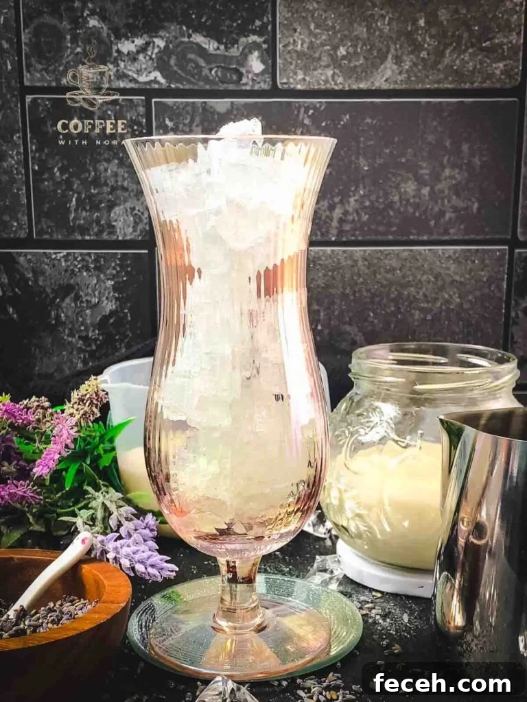 Iced Lavender Latte Recipe: How to Make a Floral Cold Coffee Drink 4 Fill your Hurricane glass with crushed ice.