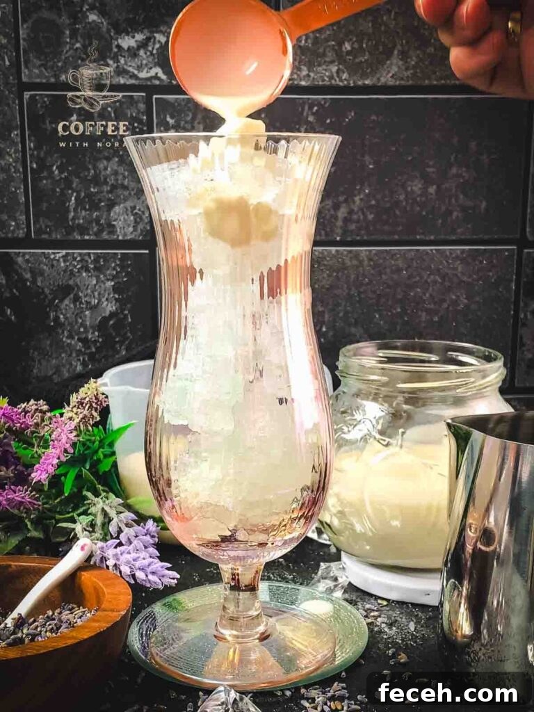Iced Lavender Latte Recipe: How to Make a Floral Cold Coffee Drink 5 Add lavender coffee creamer.