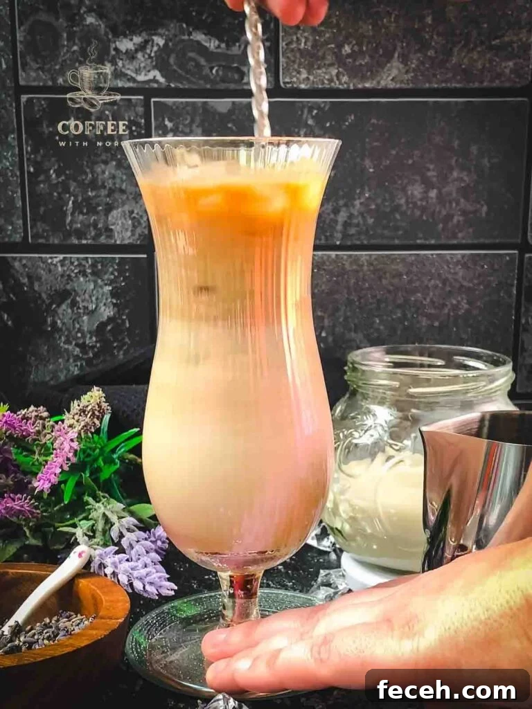 Iced Lavender Latte Recipe: How to Make a Floral Cold Coffee Drink 8 Stir the lavender iced latte using a long-stemmed spoon or bar spoon.