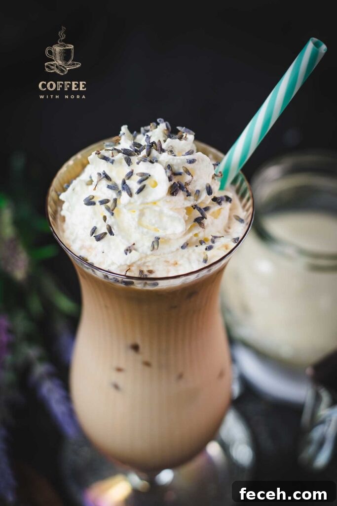 Iced Lavender Latte Recipe: How to Make a Floral Cold Coffee Drink 10 Gorgeous Hurricane glass, filled with crushed lavender iced latte, topped with whipped cream and sprinkled with lavender buds. Served with a turquoise white striped drinking straw.