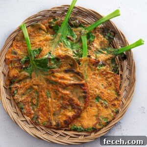 Kale gochujang pancakes in a basket tray.