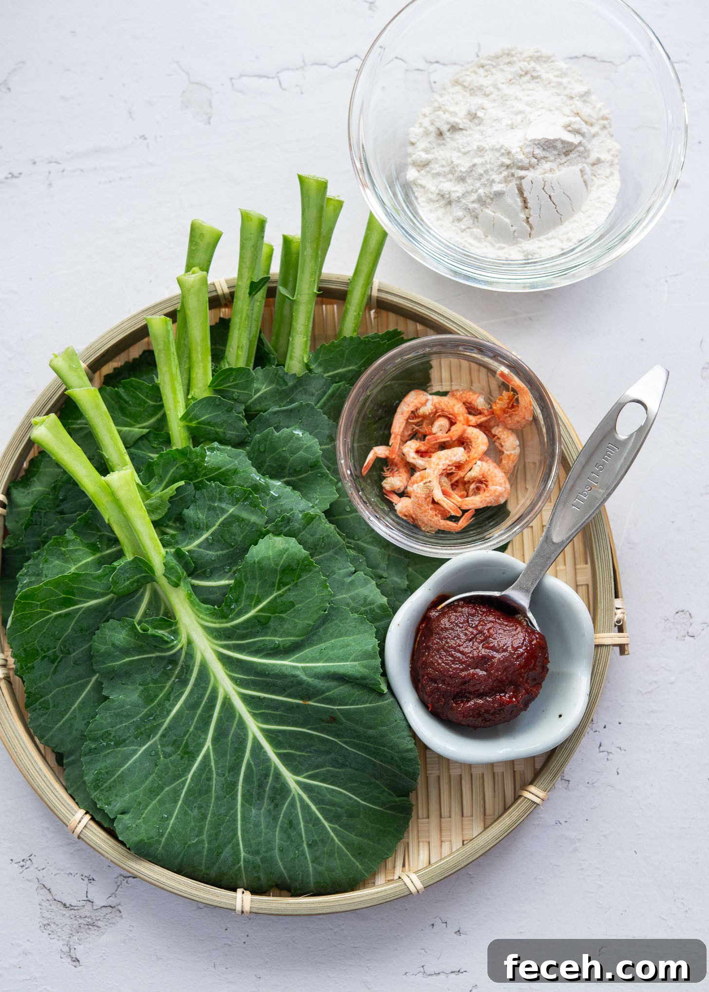 Ingredients laid out for making kale gochujang pancakes (jangtteok)