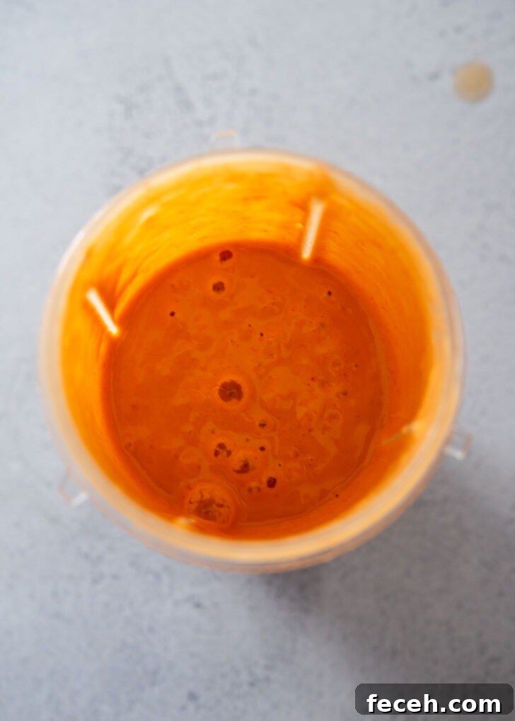 Gochujang pancake batter blended until smooth for jangtteok