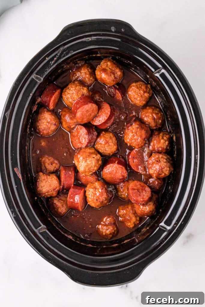 cranberry chipotle meatballs and sausage in slow cooker