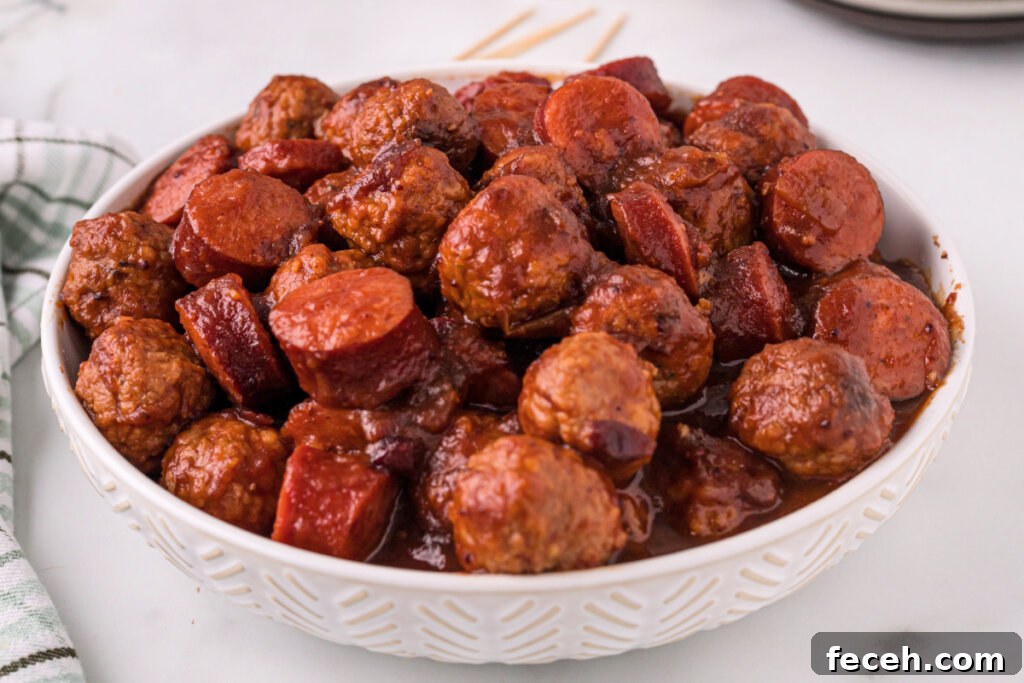 cooked cranberry chipotle meatballs and sausage in white bowl