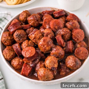 cranberry chipotle meatballs and sausage in white bowl