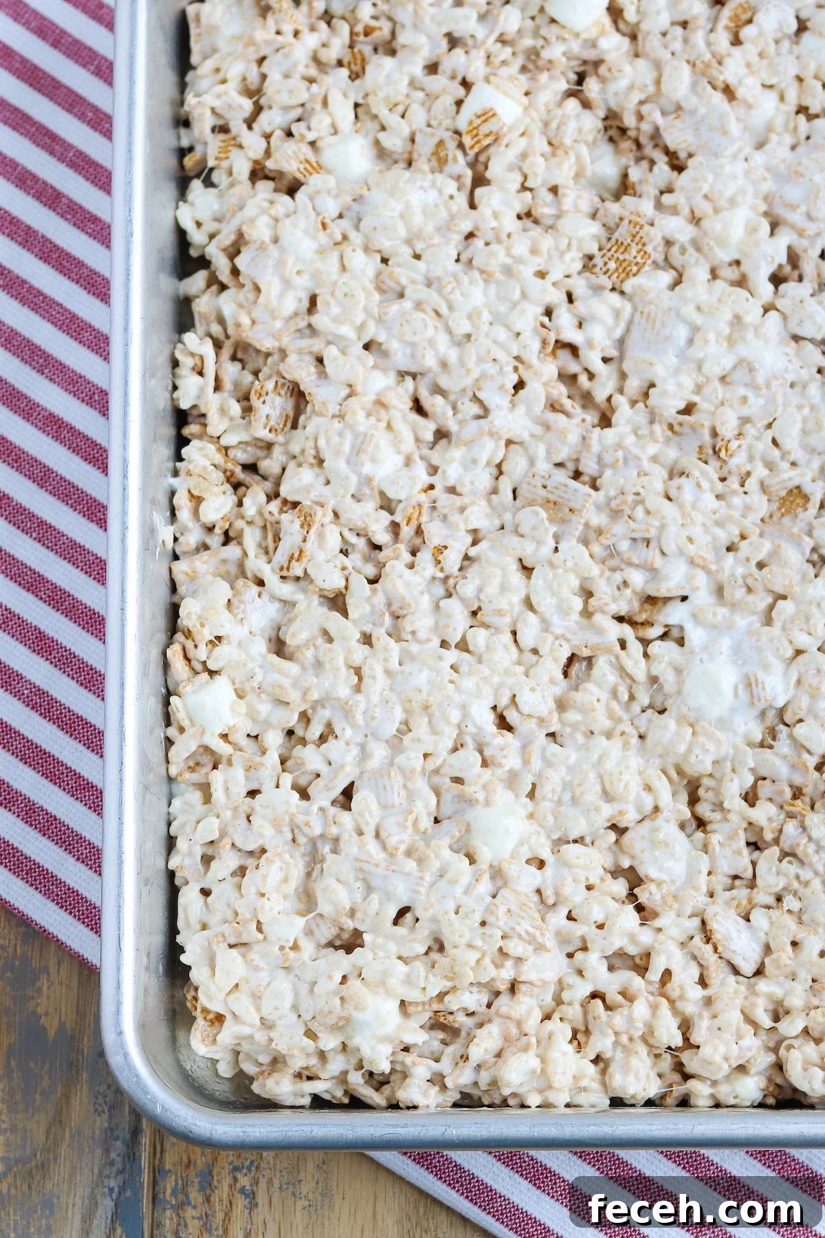 Golden Graham Rice Krispie Treats Recipe — Crispy Marshmallow Squares 5 9 X 13 cake pan of Rice Krispies