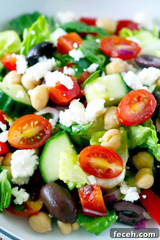 Crisp Chopped Greek Salad with Feta and Lemon Dressing 3 Close up view of Chopped Greek Salad in a bowl.