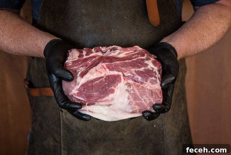 Citrus-Marinated Grilled Pork Collar Recipe for Juicy Flavor 3 Raw pork collar.