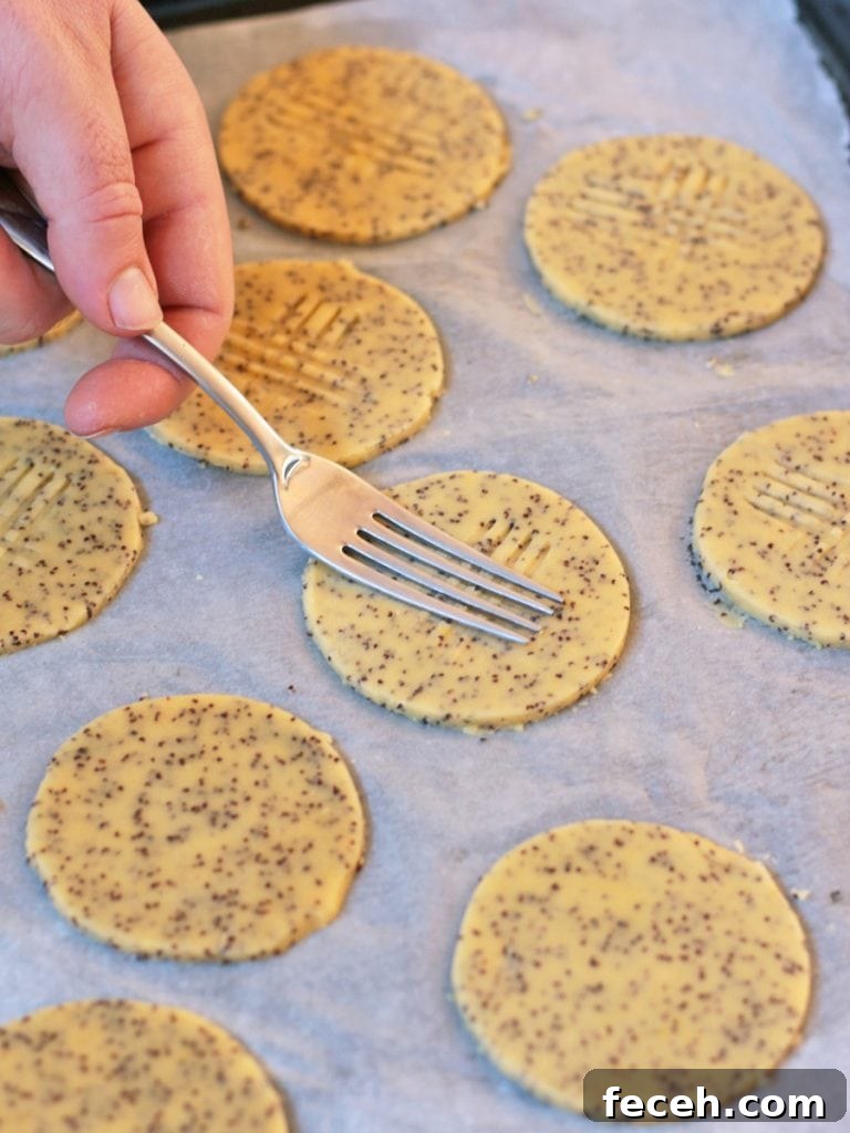 Pressing a fork on the shortbread to create the pattern