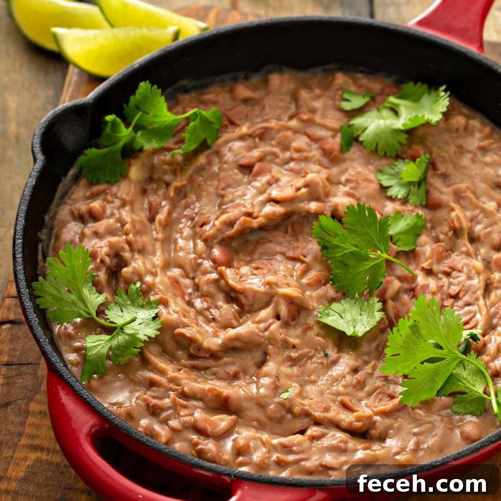 Cook Once, Eat Twice: Budget Meals That Become Delicious Leftovers 7 A skillet with homemade refried beans