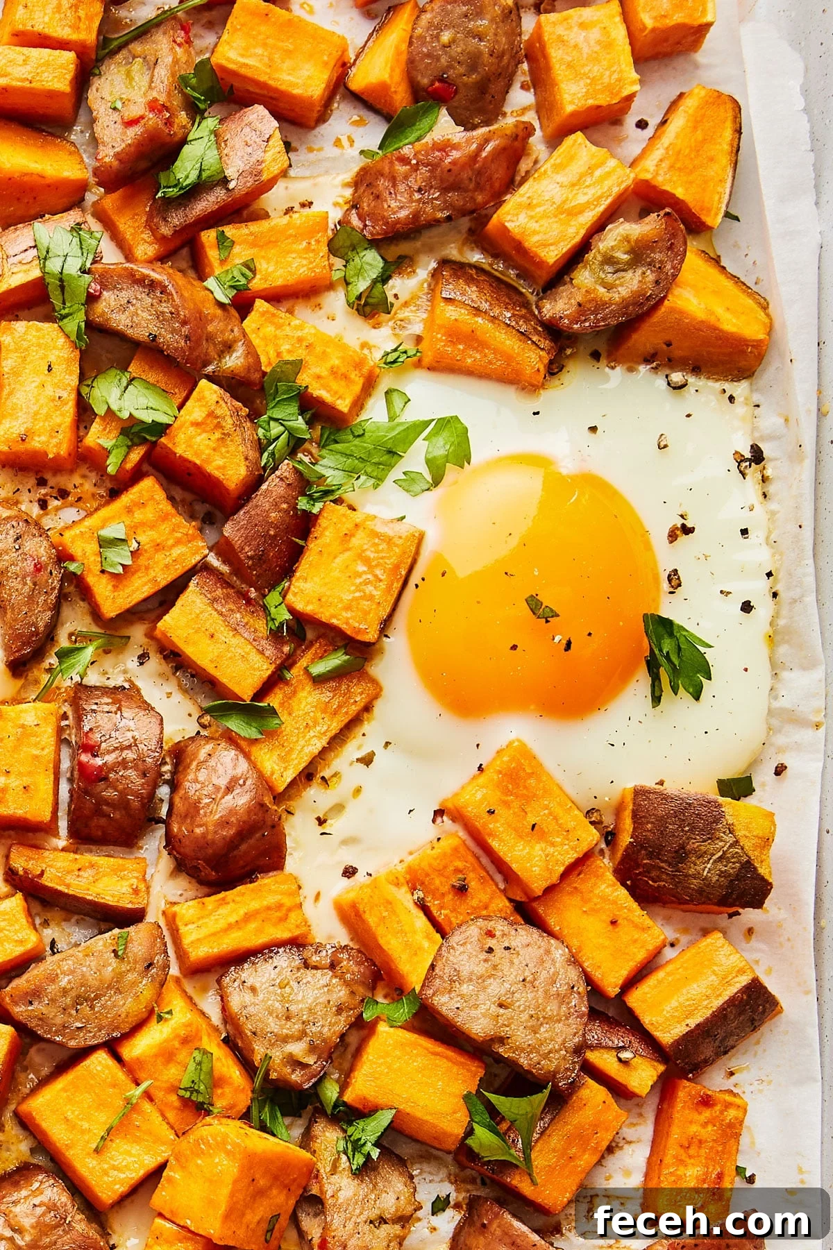 Sheet pan with sweet potato, sausage, and eggs