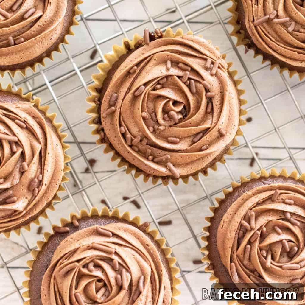 small batch chocolate frosting used to frost cupcakes on wire rack