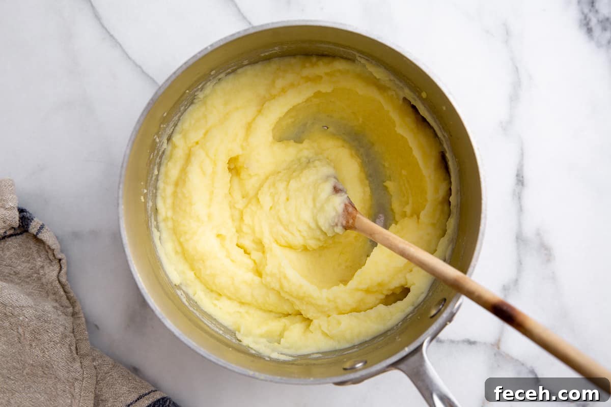 The pomme puree in a pot. 