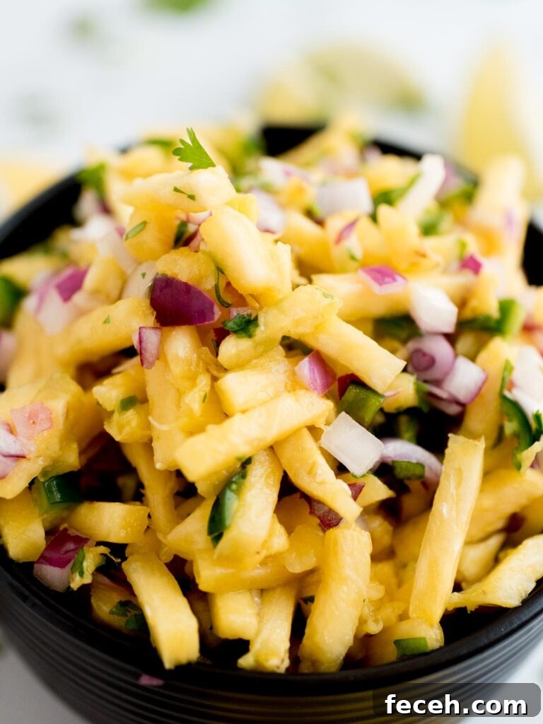 Pineapple Pico de Gallo: Fresh Tropical Salsa Recipe 3 pineapple pico de gallo in a block bowl