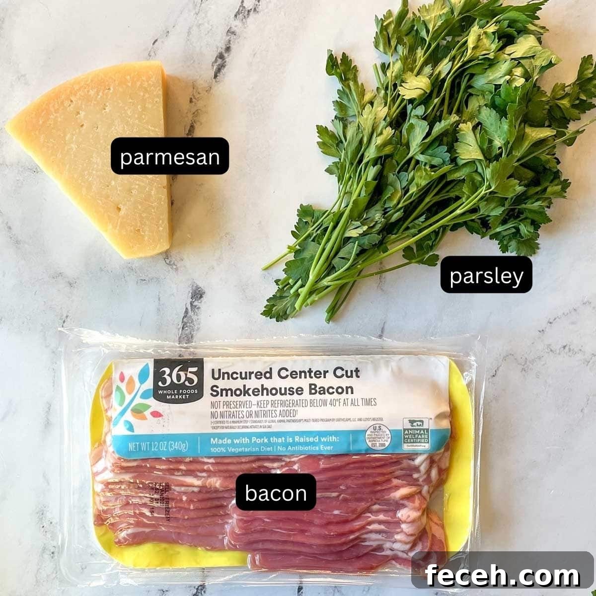 Instant Pot Navy Bean Soup Recipe for Creamy, Hearty Comfort 5 Parmesan, fresh parsley, and bacon are shown on a white marble counter.