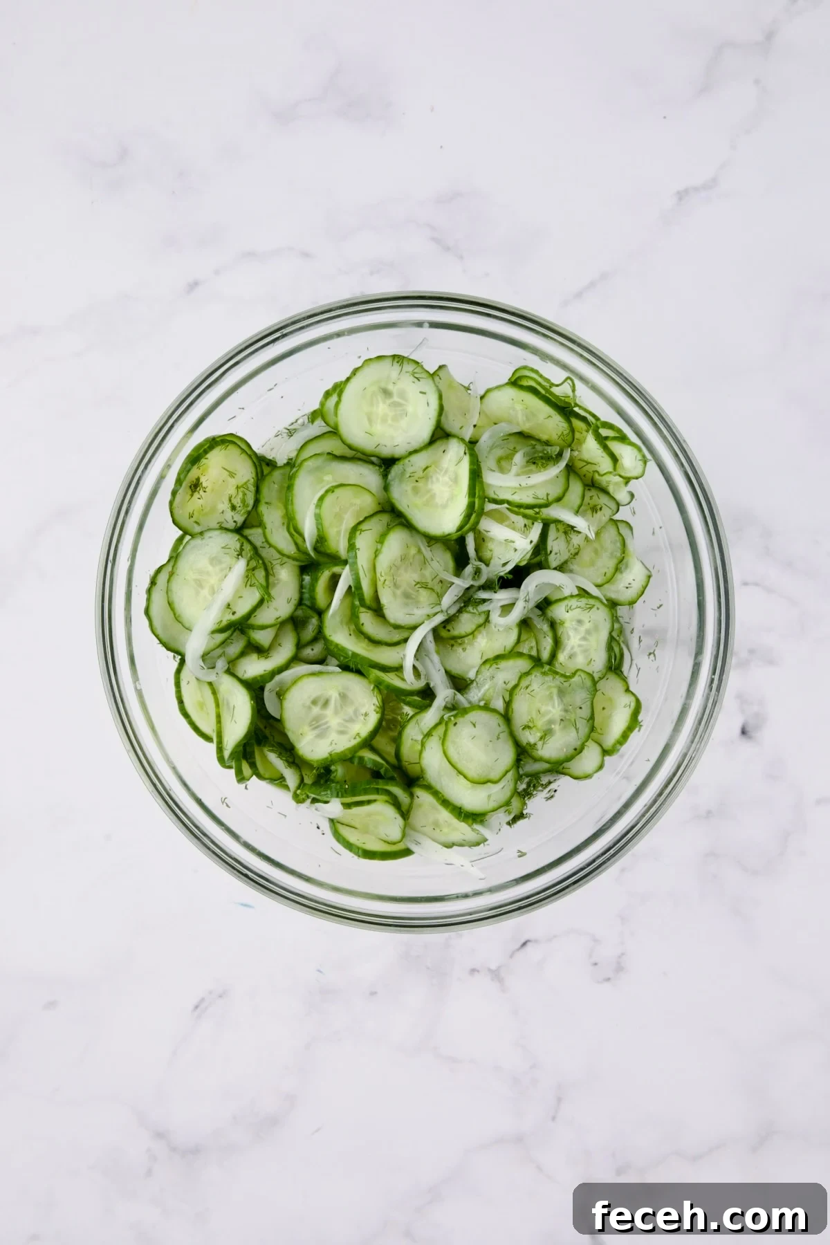 Salad in glass bowl after all ingredients combined.