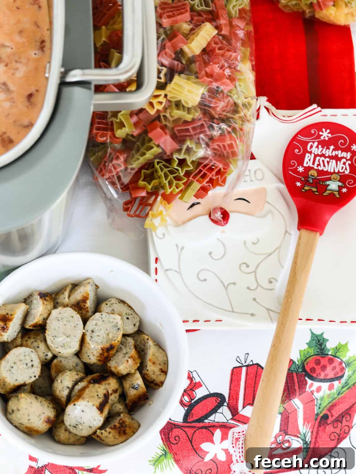 Bowl with sliced chicken sausage and holiday pasta