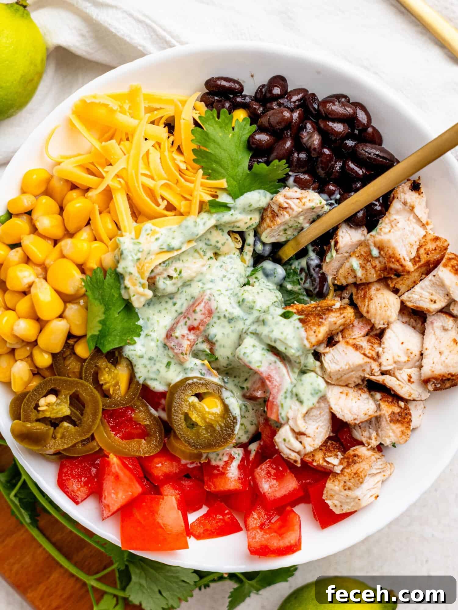 Mexican Chicken Salad ingredients in a white bowl.