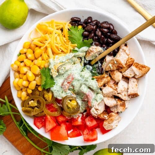 Mexican Chicken Salad ingredients in a white bowl.