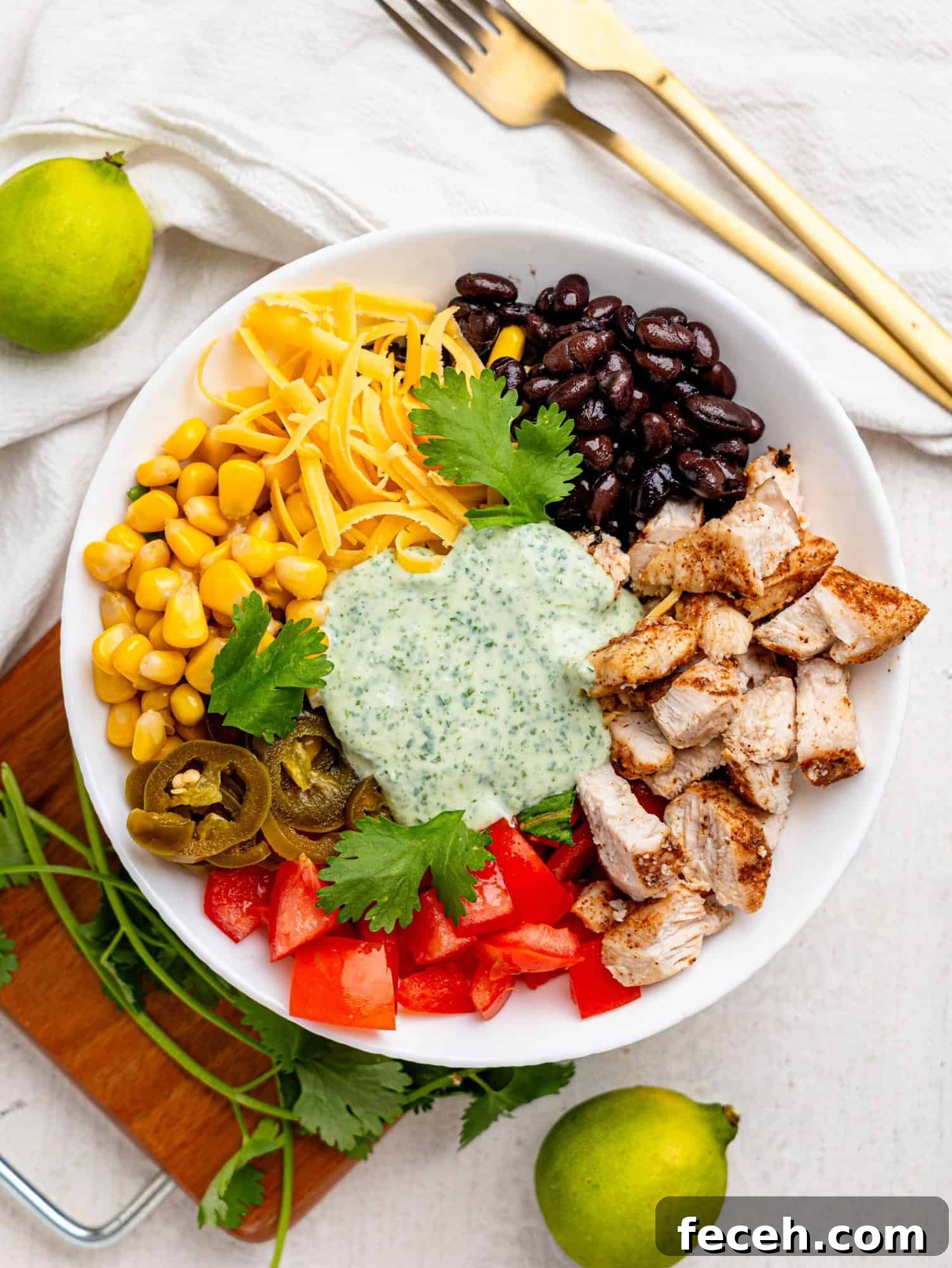 Mexican Chicken Salad ingredients in a white bowl.