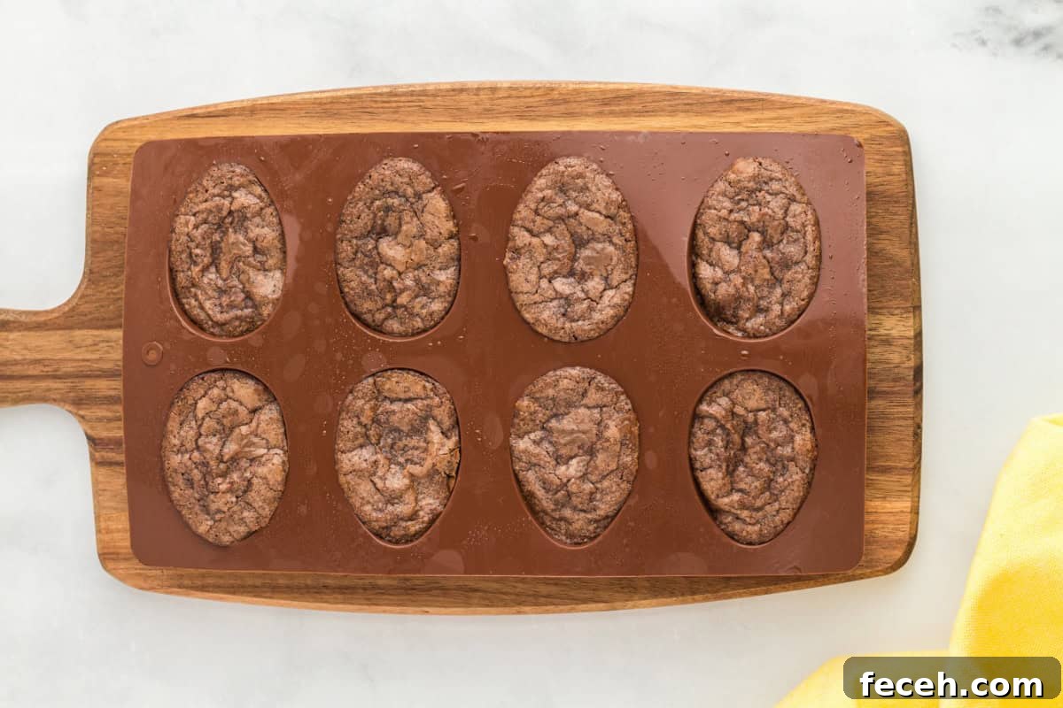 baked brownies in a silicone egg-shaped mold.