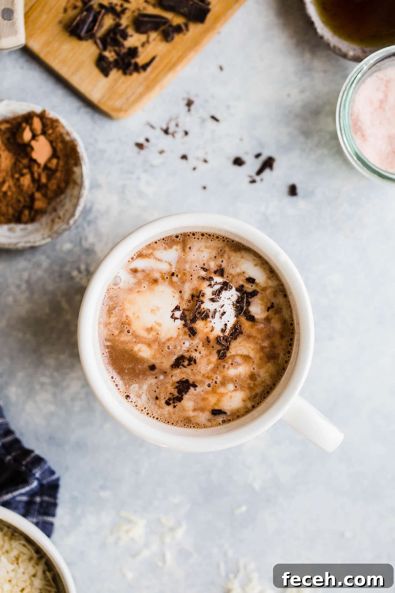 Toasted Coconut Hot Chocolate topped with coconut whipped cream and chocolate shavings.