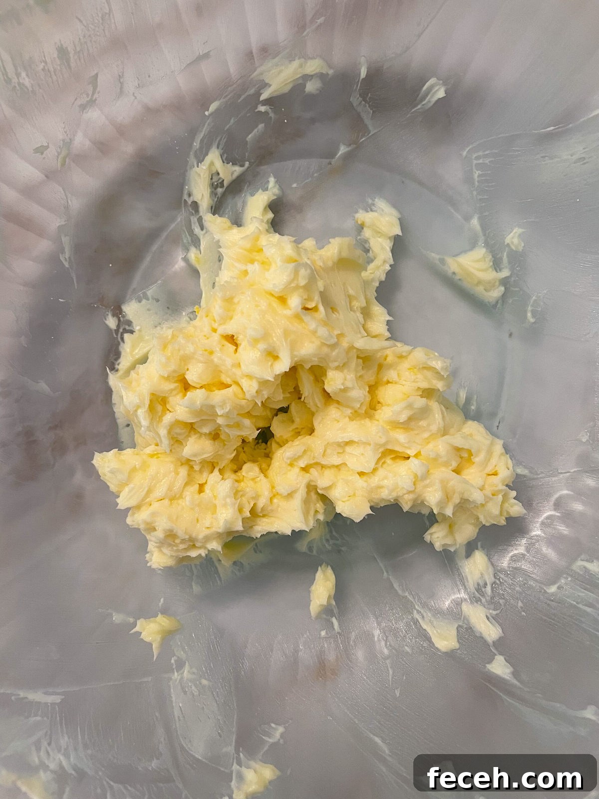 butter and sugar creamed in a bowl