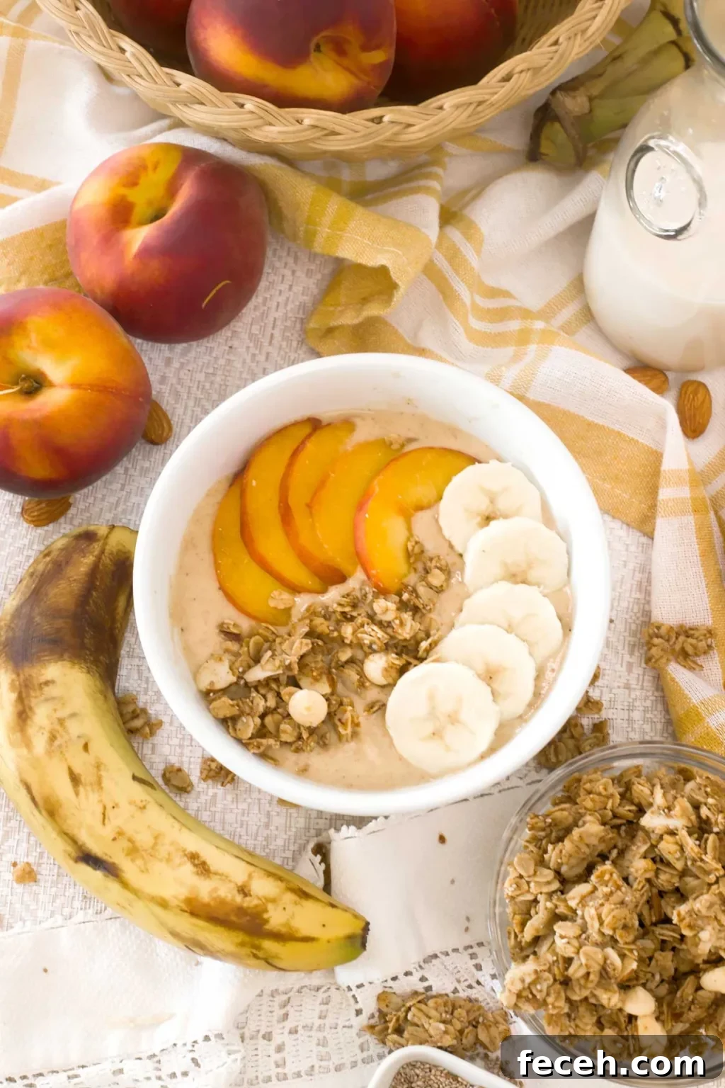 Peach Banana Smoothie Bowl topped with Vanilla Almond Granola 9 How to make the BEST-TASTING healthy peach banana smoothie bowl w/ vanilla almond granola all naturally sweetened. For high protein & energy!